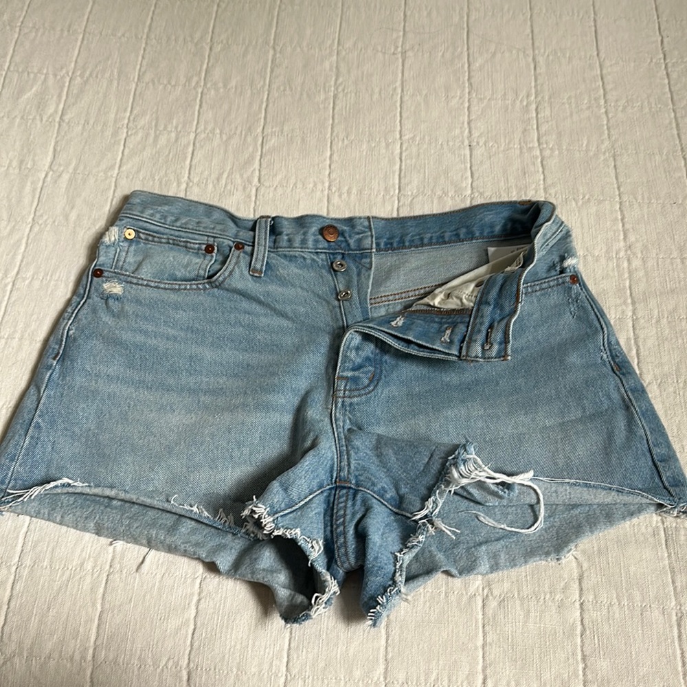 Raw hem w/ distressing light wash denim shorts from madewell. Curvy relaxed